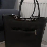 کیف مشکی|کیف، کفش، کمربند|خوی, |دیوار