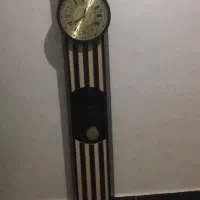 تابلو فرش و ساعت ایستاده