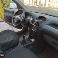 پژو ۲۰۶ تیپ ۲ رنگ گیلاسی مدل ۹۵