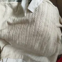 تعداد زیادی لباس در حد