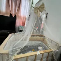 تخت نوزاد به همراه نانو و آویز تخت موزیکال