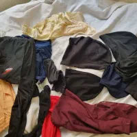 تعدادی ساق دست کلاه زیر مقنعه