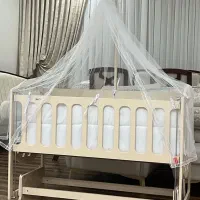 تخت کنار مادر نوزاد گهواره ای دیوانکو