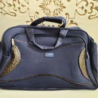 ساک سفری دستی دو رنگ قهوه ای و سرمه ای سالمOral