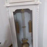 یک عدد ساعت ایستاده و بوفه با هم ب فروش می‌رسد