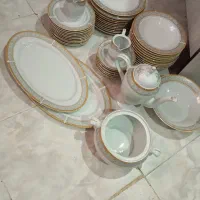 سرویس چینی قندان آبکش کنارسماورکفگیرمرغ خوری پارچ