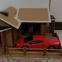 ماکت خانه ساخته شده از کارتن و چوب