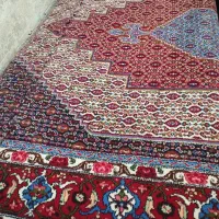 یک عدد فرش دستبافت