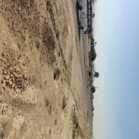 زمین تجاری صنعتی حاشیه جاده روبرو روستا برزل اباد