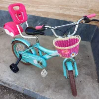دوچرخه صورتی سایز۱۶ رامبو  کمکدار در حد نو