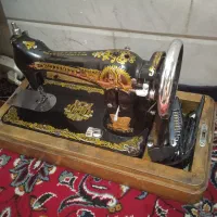 چرخ خیاطی و تخت دوطبقه