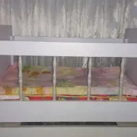 تخت گهواره ای نوزاد