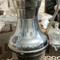 پارچ برنجی کنار سماوری قدمت بالای ۴۰ سال