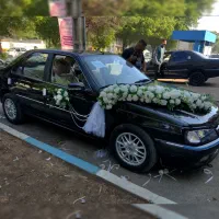 تزیین ماشین ودسته گل
