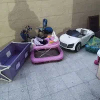 ماشین کودک روروئک تاب و دوچرخه