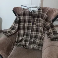 تعدای هودی ولباس