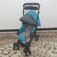 کالسکه کریر گهواره و روروک نوزاد