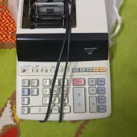 ۲ عدد ماشین حساب برقی