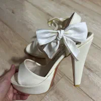 کفش مجلسی|کیف، کفش، کمربند|رشت, امین الضرب|دیوار