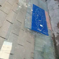 شیشه درب مغازه‌ای