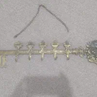 چنگه لباس برنجی