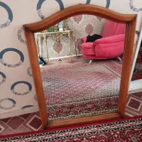 اینه دور چوب نیم قد