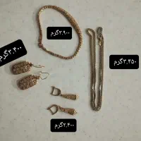 گوشواره دستبند و زنجیر طلا سبک ۱۰۰بالای تابلو