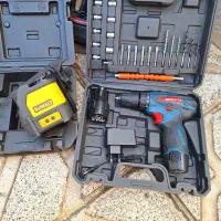 ابزار کناف ترازلیزری المانی دیوالت دلر دریل شارژی