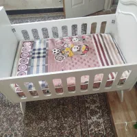 تخت خواب گهواره‌ای کودک