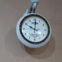 ساعت دو طرفه سالم دو موتوره