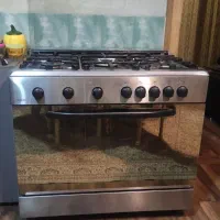 اجاق گاز رومگا در حد نو فر و جوجه گردان آکبند