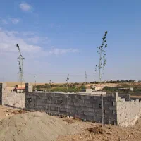 زمین ۴ دیواری خور هشتگرد با حق اب لوله کشی