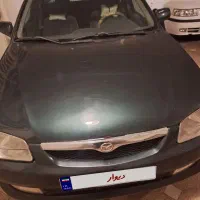 مزدا۳۲۳ دوررنگ  موتورهفته پیش تعمیر شده