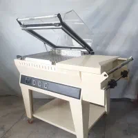 دستگاه بسته بندی شیرینگ کابینی هم مدلnps80 نادی پک