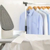 جادکمه زن و اتوکار خانم کار در تولیدی