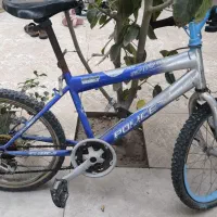 دو عدد دوچرخه ۲۴ و ۲۲ روی هم ۳