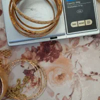 طلا  حدود  ۶۲ گرم  سالم  یک شکسته دارد