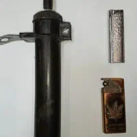 تلمبه ی دوچرخه و تعدادی فندک