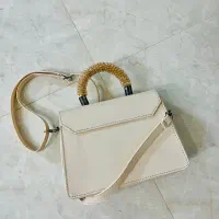 کیف مجلسی|کیف، کفش، کمربند|کاشان, آیت الله سعیدی|دیوار