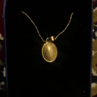 مقداری طلا نزدیک به ۱۳ گرم نو