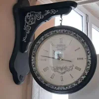 ساعت دیواری دوطرفه