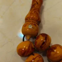 تسبیح کهربا تراش نظیر مُهر دار