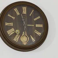 ساعت دیواری طرح چوب