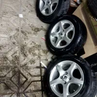 ۴ حلقه رینگ و لاستیک ۵ پر سایز ۱۵ لاستیک ۶۰ درصد|قطعات یدکی و لوازم جانبی|مشهد, سرافرازان|دیوار