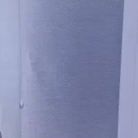 تعدادی پرده شید رول ترک رنگ نقره ای آبی براق