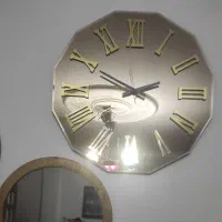ساعت دیواری آینه ای
