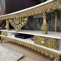 زیر تلویزیونی و تلفن برنجه