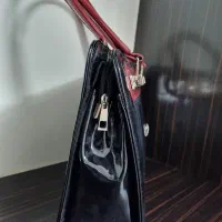 کیف نو|کیف، کفش، کمربند|قم, ژاندارمها|دیوار