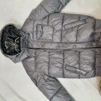 کاپشن|لباس|قم, باجک دو|دیوار