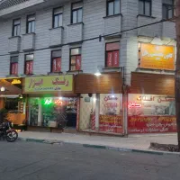 بلوار دهکده المپیک مغازه بر خیابان دهکده